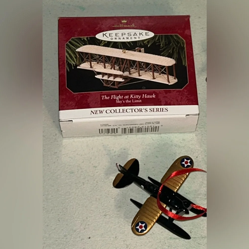 2 Hallmark Ornaments 1999 Sky's the Limit Airplane 1997 The Flight At Kitty Hawk